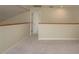 Loft with new carpet perfect for a study or playroom at 3130 Eagles Landing W Cir, Clearwater, FL 33761
