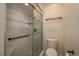 Nicely updated shower and toilet in the bathroom at 3130 Eagles Landing W Cir, Clearwater, FL 33761