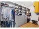 Walk-in closet featuring custom shelving, drawers, and ample storage space for clothes and accessories at 3321 Jackson N St, St Petersburg, FL 33704