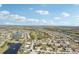 Expansive aerial view of a residential community with lakes, golf course, and beautiful landscape at 335 Stroll Ln, Sun City Center, FL 33573