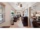 Inviting office space with natural light, neutral colors, and direct access to other rooms at 335 Stroll Ln, Sun City Center, FL 33573