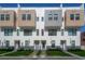 Modern townhome exterior featuring clean lines, mixed textures and a well-manicured lawn at 337 15Th N St, St Petersburg, FL 33705