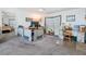 Bright Living Room featuring office space with plentiful natural light at 37508 Gill Ave, Zephyrhills, FL 33541