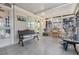 Cozy sun room featuring tiled floor, sliding windows, and comfortable seating at 37508 Gill Ave, Zephyrhills, FL 33541