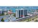 High-rise condo building with covered parking and bay views in a waterfront neighborhood at 400 Island Way # 612, Clearwater Beach, FL 33767