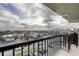 Balcony overlooking the city with seating, offering views of the cityscape and surrounding neighborhood at 400 Island Way # 612, Clearwater Beach, FL 33767