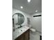 Bright bathroom featuring marble floors, white countertops, vessel sink, and modern fixtures at 400 Island Way # 612, Clearwater Beach, FL 33767