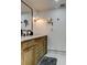 Updated bathroom featuring a marble vanity, modern fixtures, and classic finishes at 400 Island Way # 612, Clearwater Beach, FL 33767