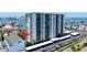 Condo building with balconies and parking, situated in a desirable waterfront community at 400 Island Way # 612, Clearwater Beach, FL 33767