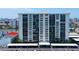 Spacious condo building featuring ample parking and beautiful views of the surrounding city at 400 Island Way # 612, Clearwater Beach, FL 33767
