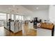 Bright, open kitchen with marble island, updated appliances, and herringbone floors at 400 Island Way # 612, Clearwater Beach, FL 33767