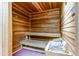 Wood-paneled sauna features built-in benches and a heater for a relaxing spa experience at 400 Island Way # 612, Clearwater Beach, FL 33767