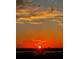 Scenic sunset view of a vibrant orange sky over the ocean at 400 Island Way # 612, Clearwater Beach, FL 33767