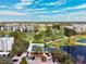 Wide aerial shot captures the building overlooking the golf course at 4240 Ironwood Cir # 404, Bradenton, FL 34209