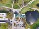 Overhead view of the building situated near a golf course and a tranquil pond at 4240 Ironwood Cir # 404, Bradenton, FL 34209