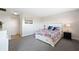 Well-lit bedroom boasts a comfortable bed, and neutral walls at 4240 Ironwood Cir # 404, Bradenton, FL 34209