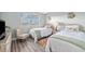 Inviting guest bedroom featuring twin beds, soft decor, and serene atmosphere at 4240 Ironwood Cir # 404, Bradenton, FL 34209