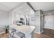 Bright and airy kitchen with a breakfast bar, stainless steel appliances, and white cabinetry at 4240 Ironwood Cir # 404, Bradenton, FL 34209