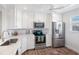 Well lit kitchen with white cabinetry, stainless steel appliances, and countertops at 4240 Ironwood Cir # 404, Bradenton, FL 34209