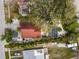 Aerial view of the property featuring a pool and shaded patio at 611 Casabella Dr, Bradenton, FL 34209