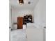 Cozy bedroom featuring white walls, tile flooring, and a comfortable bed, perfect for relaxation at 618 Manns Harbor Dr, Apollo Beach, FL 33572