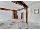 The primary bedroom features a four-poster bed and an adjoining full bathroom at 618 Manns Harbor Dr, Apollo Beach, FL 33572