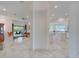 Spacious open-concept living area with tile flooring, large windows, and recessed lighting at 618 Manns Harbor Dr, Apollo Beach, FL 33572
