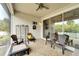 Welcoming screened patio with ample seating and an outdoor dining area; perfect for entertaining at 618 Manns Harbor Dr, Apollo Beach, FL 33572