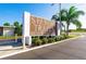 Entrance to the community featuring manicured landscaping and a large sign at 7133 El Matador St, Zephyrhills, FL 33541