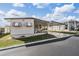 Charming home with a covered carport and awning-covered windows at 7133 El Matador St, Zephyrhills, FL 33541