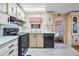 A cozy kitchen features a practical layout with modern appliances and great counter space at 7133 El Matador St, Zephyrhills, FL 33541