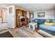 Living room featuring comfortable seating, natural light, and open floor plan at 7133 El Matador St, Zephyrhills, FL 33541