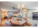 Open floor plan connects dining area and kitchen, creating a welcoming and spacious living space at 7133 El Matador St, Zephyrhills, FL 33541