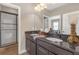 Elegant bathroom with double sinks, dark wood cabinetry, and a glass-enclosed shower at 8414 Eagle Brook Dr, Land O Lakes, FL 34638