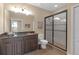 Bathroom with vanity, large mirror, toilet, and large glass shower at 8414 Eagle Brook Dr, Land O Lakes, FL 34638