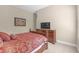 Spacious bedroom featuring carpeted floors, neutral walls, and a window with blinds at 8414 Eagle Brook Dr, Land O Lakes, FL 34638
