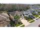 Beautiful two-story home with a three-car garage, lush landscaping, and spacious driveway at 8414 Eagle Brook Dr, Land O Lakes, FL 34638