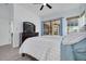 Primary bedroom showcasing wood-look tile flooring and a ceiling fan at 872 Live Oak Ne Ter, St Petersburg, FL 33703