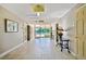 Bright hallway leads to the pool and provides a welcoming space for residents and guests at 10355 Paradise Blvd # 909, Treasure Island, FL 33706