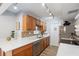 Well-equipped kitchen featuring stainless steel appliances and quartz countertops at 10355 Paradise Blvd # 909, Treasure Island, FL 33706