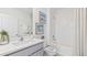 Clean bathroom with a shower-tub combination and neutral decor at 10622 Farm Hill Ave, Land O Lakes, FL 34638