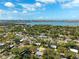 Stunning aerial view of a charming neighborhood with lush greenery and water views at 1119 77Th N St, St Petersburg, FL 33710