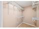 Walk-in closet with installed shelving system for optimal organization at 1119 77Th N St, St Petersburg, FL 33710