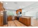 Stylish kitchen featuring stainless steel appliances, granite countertops, and wood cabinets at 1119 77Th N St, St Petersburg, FL 33710