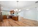 Open kitchen with stainless steel appliances, granite countertops, and wood cabinets at 1119 77Th N St, St Petersburg, FL 33710