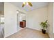 Cozy dining area featuring tile flooring and a large window, enhancing the room's bright and airy ambiance at 11407 3Rd N St # 1, St Petersburg, FL 33716