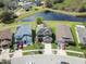 Charming home with a well-manicured lawn, and long driveway nestled in a tranquil neighborhood with a scenic water view at 11517 Weston Course Loop, Riverview, FL 33579
