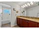 Bathroom with granite countertop and double sinks at 11517 Weston Course Loop, Riverview, FL 33579