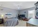 Carpeted bedroom with a window, ceiling fan, and desk area at 11517 Weston Course Loop, Riverview, FL 33579