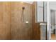 Beautifully tiled shower with a glass enclosure and modern fixtures at 11517 Weston Course Loop, Riverview, FL 33579